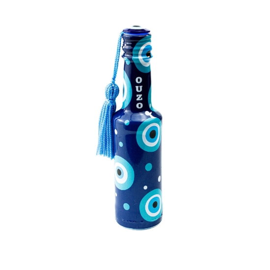 A studio shot of the elegant elenianna mini ouzo bottle, featuring a distinct Aegean blue evil eye design and a clean white label.